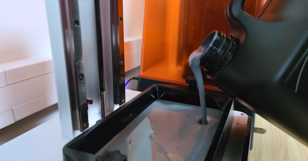 Pour the resin into the vat for 3D printing